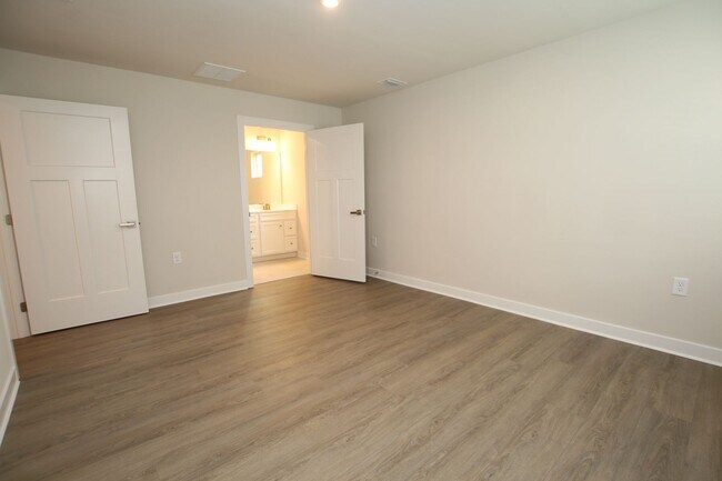 Building Photo - Maintenance Free Living in this Brand New ...