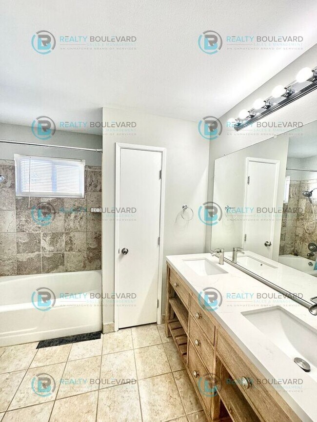 Building Photo - 2-bed, 2-bath, 2-story townhome with pool and park like setting outside the front door.