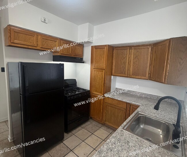 Building Photo - 600 W 46th Ave