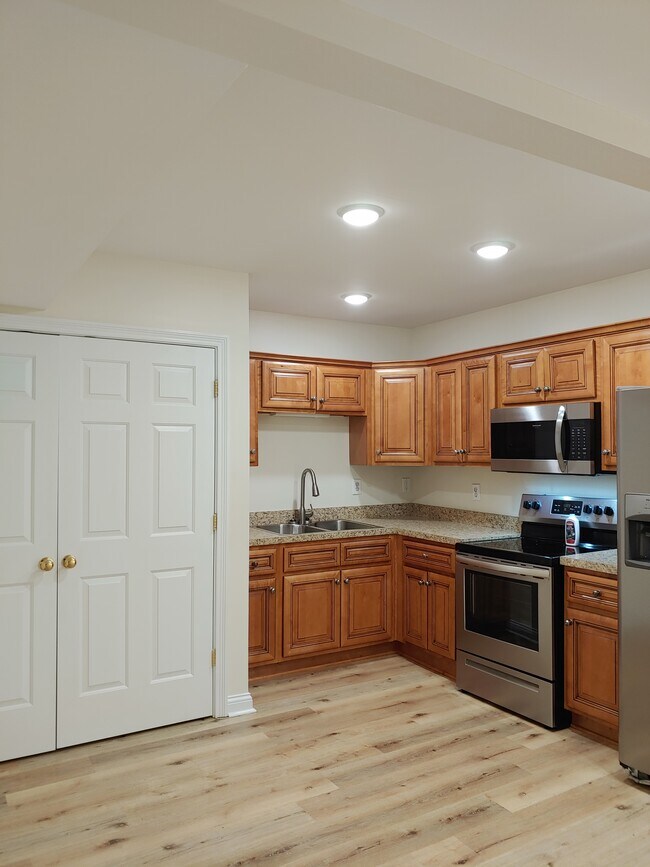 LAUNDRY ROOM LOCATED BEHIND FRENCH DOORS - 107 Manor Dr