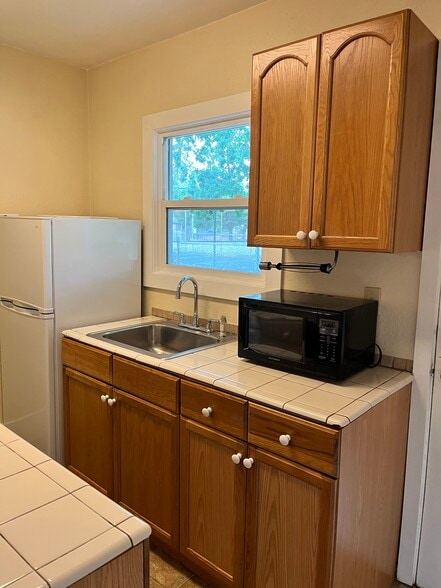 kitchen with door going to back yard area - 441 16th St SE