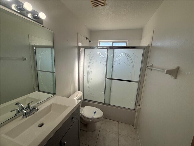 Building Photo - 8722 Rain Forest Pl