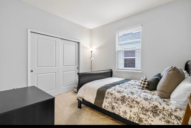 Building Photo - Water Front Home- 4 Large Bedrooms-3 baths Gated Community Call Sheila Campbell 407-687-7900