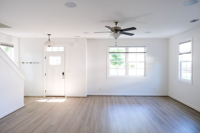 Building Photo - Like-new 3 bedroom, 2.5 bath house with an organic pond!