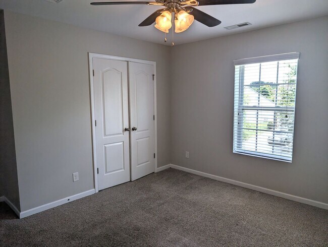 Building Photo - Pristine, move in ready Home located in th...