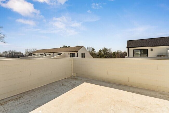 Building Photo - High-End 2BR Townhome | Rooftop Terrace + 2-Car Garage | 24-Unit Community