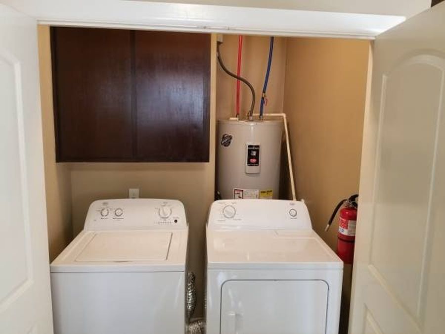 Laundry with washer dryer and heater - 1428 Leann Rimes Rd