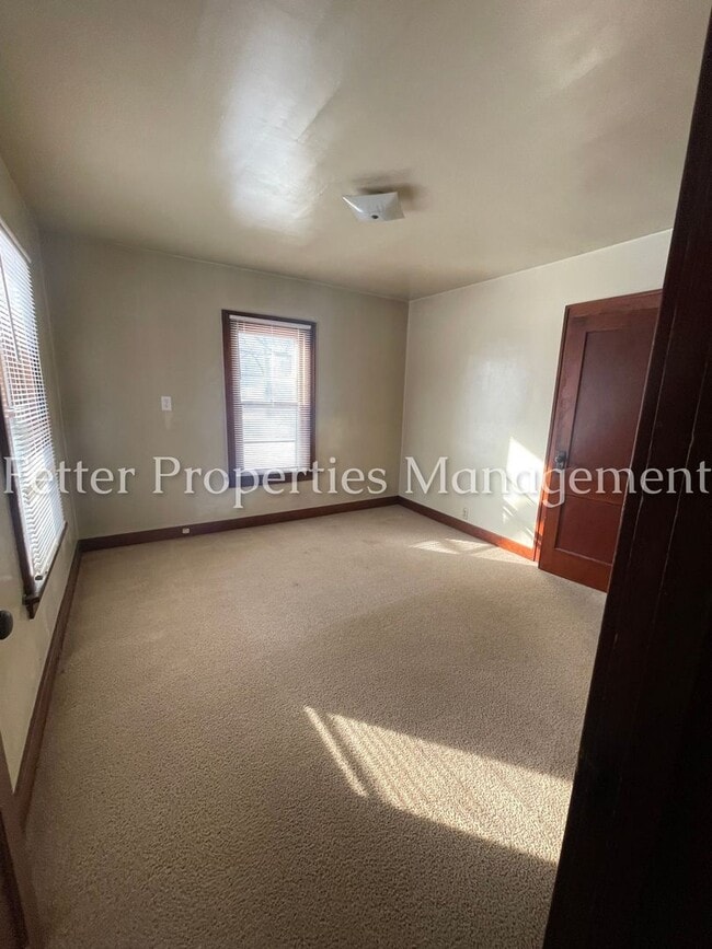 Building Photo - First Month's Rent Half Price!