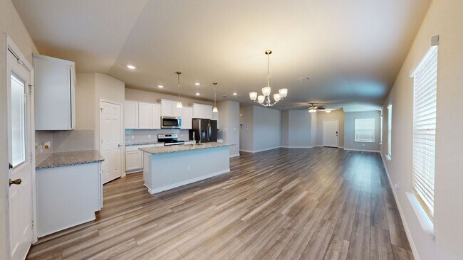 Building Photo - Discover this spacious 4-bedroom, 2-bath home with 3 CAR GARAGE!!!