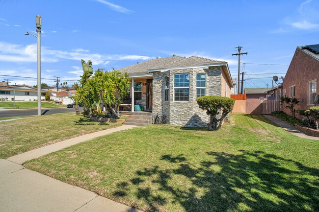 Building Photo - Stunning Remodeled Corner-Lot Home – An En...