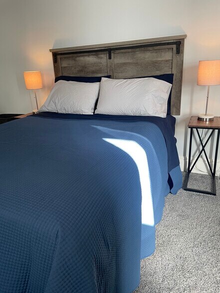 Queen sized bed in HUGE primary bedroom. - 28 Saint James Pl