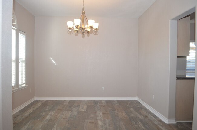 Building Photo - YOUR COASTAL PARADISE AWAITS!