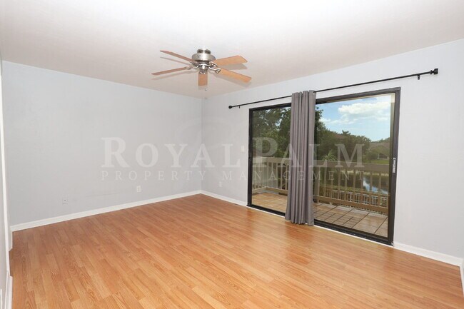 Building Photo - 2 Bed, 2.5 Bath Townhouse with Balcony, Pool & Prime Bonita Springs Location