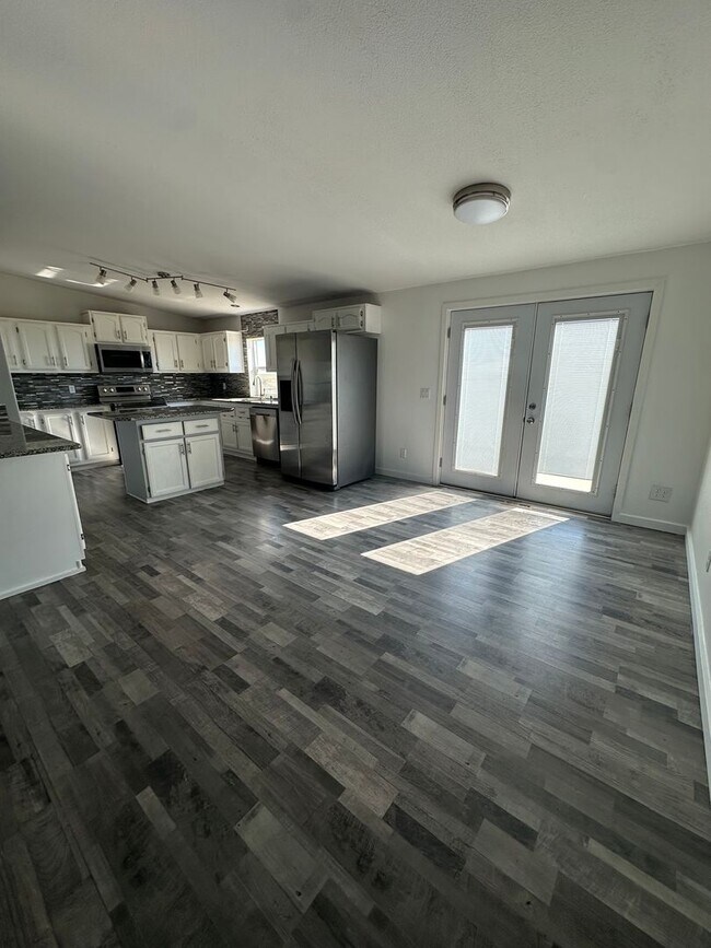 Building Photo - MODERN UPGRADES AND RURAL LIVING IN PEYTON