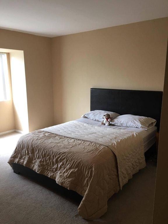 Building Photo - This beautifully maintained upstairs unit ...