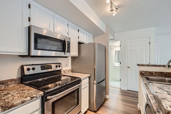 Building Photo - MOVE-IN SPECIAL ($500): Spacious Condo wit...