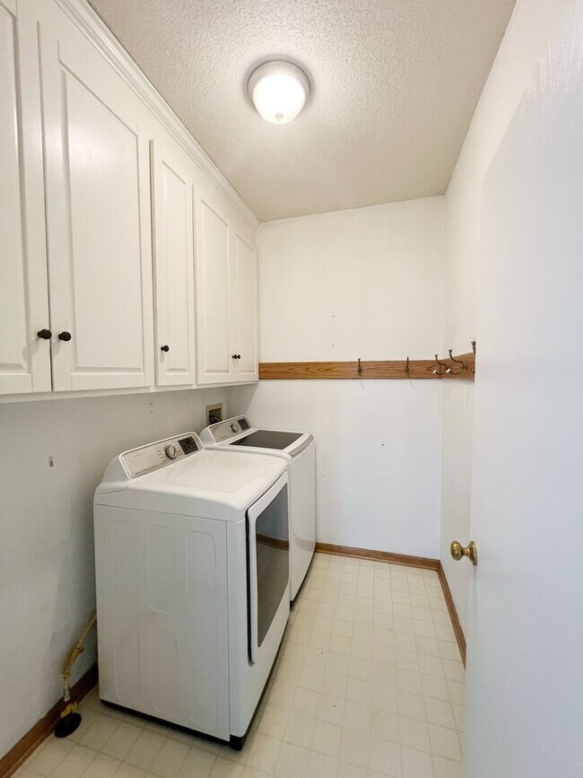Building Photo - SEE IT NOW: Spacious 4-Bed Home with Finis...