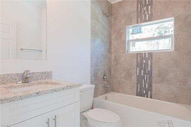 Building Photo - AVAILABLE NOW-TROPIC ACRES-THREE BEDROOM T...