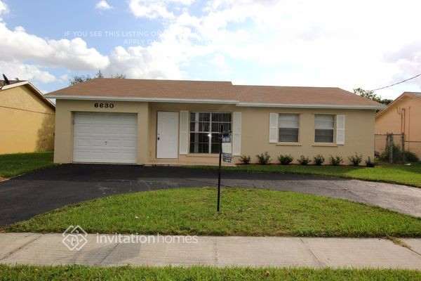 Building Photo - 6630 NW 24th Ct