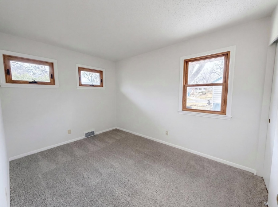 Building Photo - 8615 Virginia Cir N