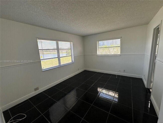Building Photo - 8710 N Sherman Cir