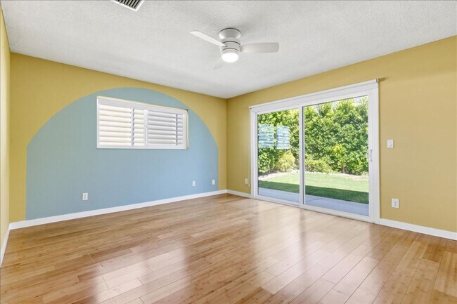 Building Photo - 3 bed / 2 Bath Mid-Century Home with Two-Car Garage, Soaking Pool and Manicured Backyard!