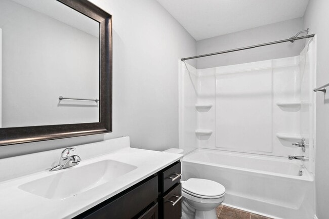 Building Photo - Pet Friendly Three Bedroom with Bonus!