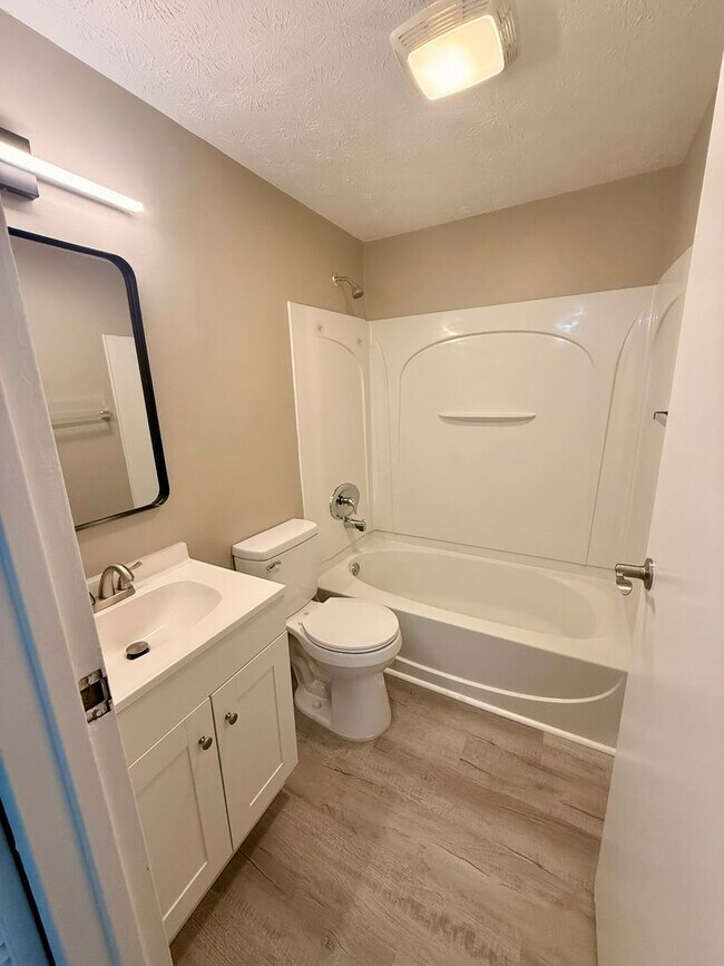 Building Photo - Move-In Ready 2BR with Stunning Granite + Fenced Backyard