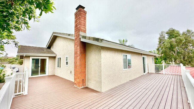Building Photo - Spacious Two-Story Home with Three-Car Att...