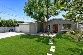 Building Photo - Updated 3-Bedroom Pool Home with Open Layo...