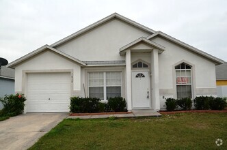 Building Photo - Cute 3/2 House with Laminate Flooring and ...