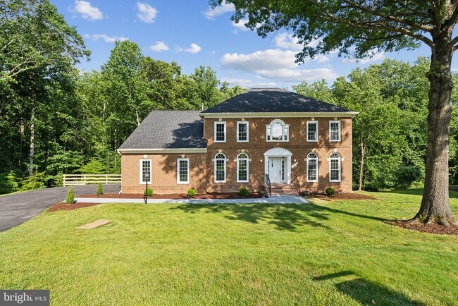 Building Photo - 10899 Woodland Falls Dr