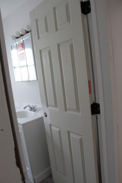 All new doors in and being painted. All new trim and baseboards, in and painted. - 1395 Ross Ave