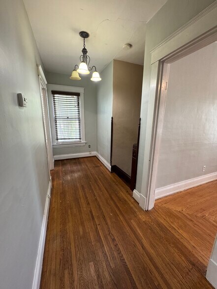 Hallway top of stairs off kitchen/ Fam Rm. - 443 W Loveland Ave