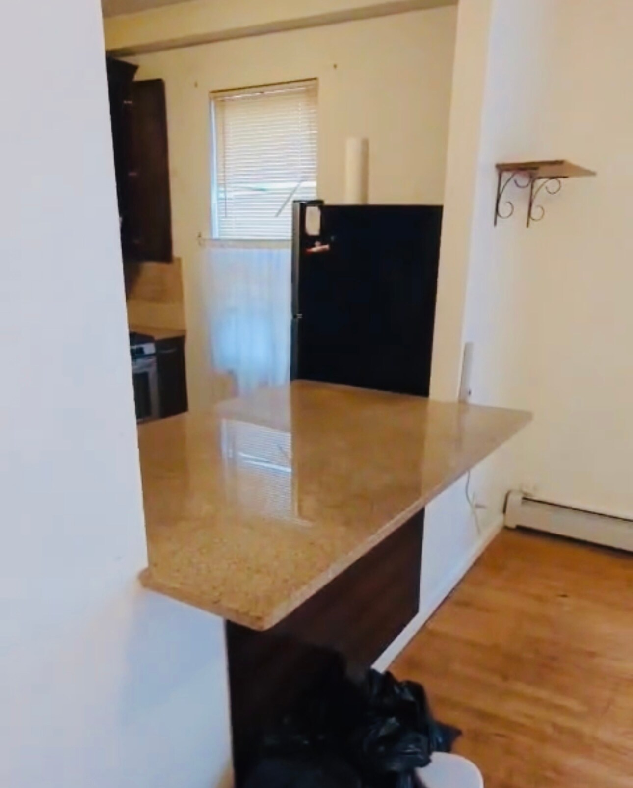 Kitchen island + living room. - 1142 30th Rd