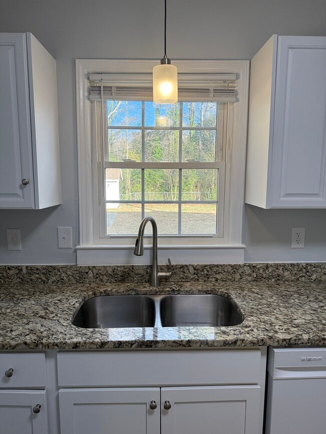 Building Photo - BIG House & BIG Fenced Yard. Plus Master Suite, Den, Shed, and More!