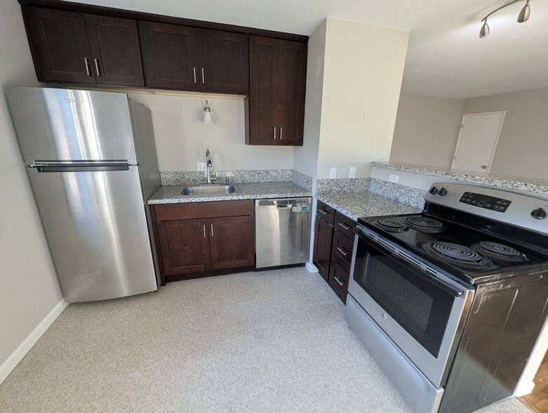 Kitchen with stainless appliances - 1626 Southeast Lexington Street