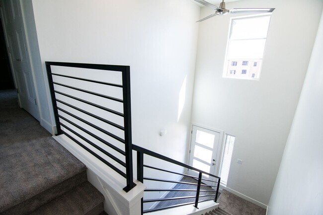 Building Photo - Gorgeous 2-Story Townhome with Finished Ba...