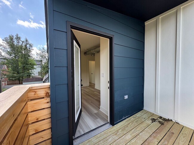 Building Photo - Vaulted Ceilings & Hardwood Floors in This Charming Indianapolis L