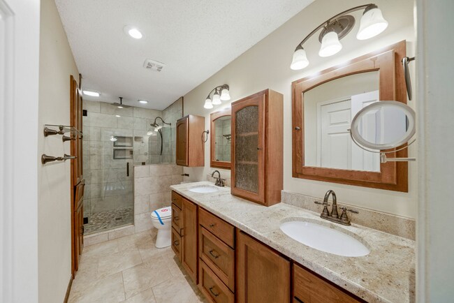 Building Photo - Sign your lease and receive a FREE 50" TV!!!  "Spacious 4-Bedroom Retreat with Fireplace in Charm...