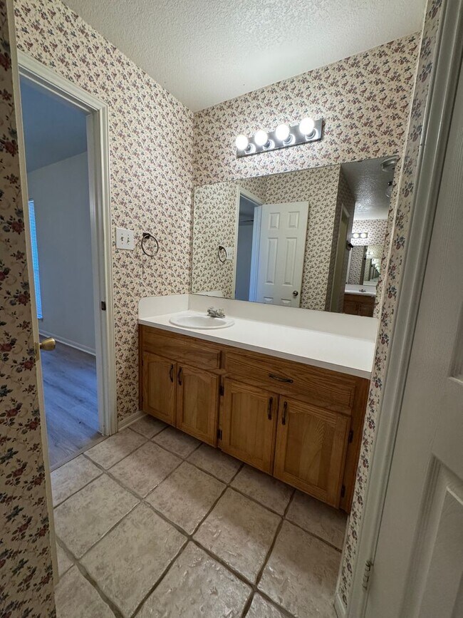 Building Photo - Charming 3-bedroom, 2-bath home offering peaceful country living on just under an acre.