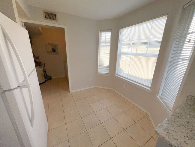 Building Photo - NEW-Remodeled bathroom & kitchen! NEW VINYL PLANK flooring & fresh paint! 2 bedroom 1 bath condo ...