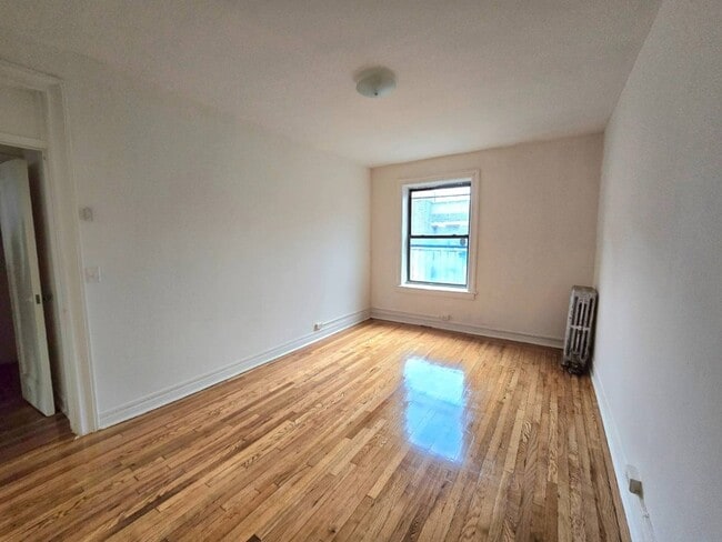 Building Photo - 59-16 Woodside Ave