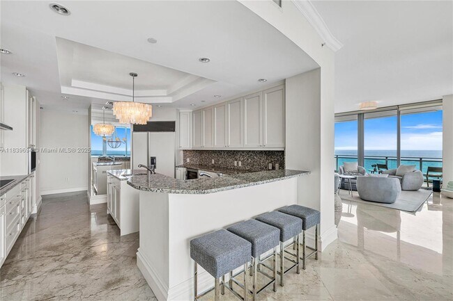 Building Photo - 10295 Collins Ave