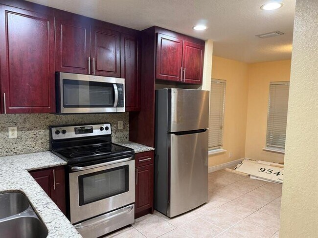 Building Photo - 9981 SW 26th Ct