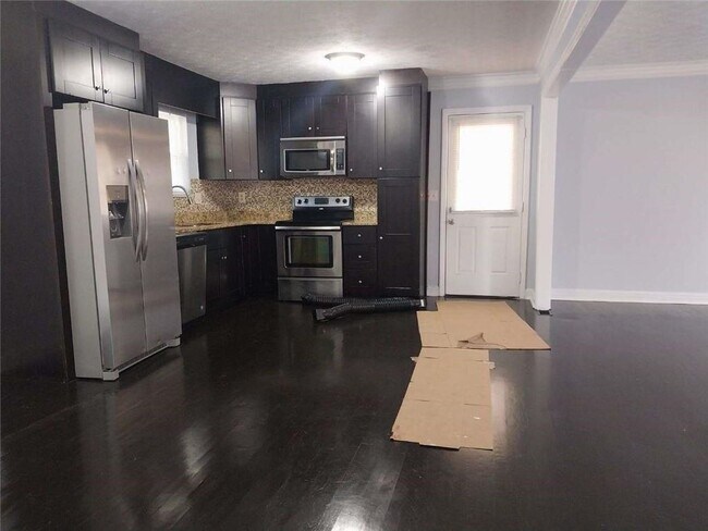 Building Photo - 6680 Cambridge Dr