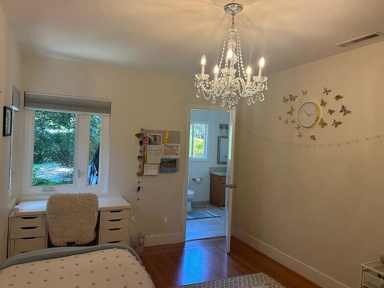 2nd bedroom or childs room connects to shared bathroom with access to outside pool - 1415 Butterfield Rd