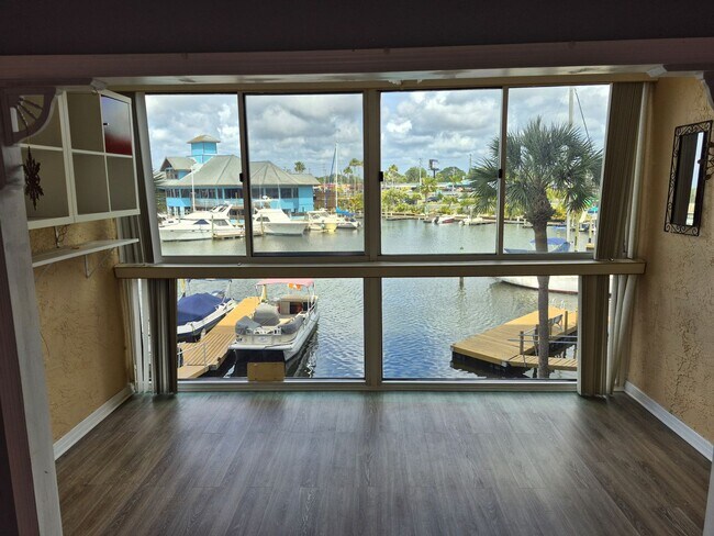 Building Photo - Waterfront Community Living | Updated 2BR/2BA Condo with Private Beach Access