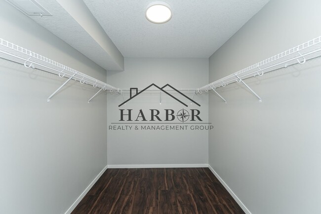 Building Photo - Brand NEW Caroline Apartments 201 -  Move ...