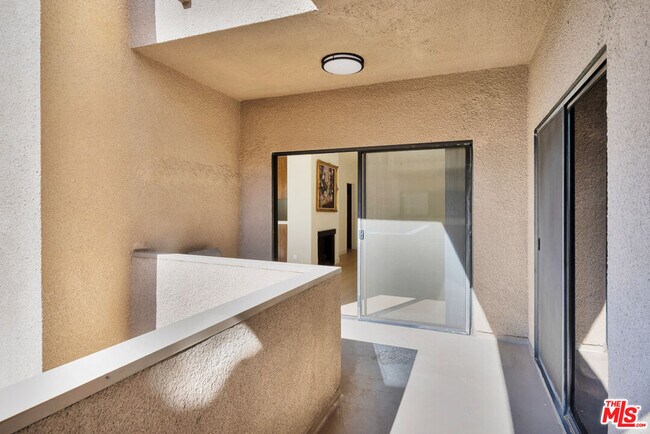 Building Photo - 1727 S Bentley Ave